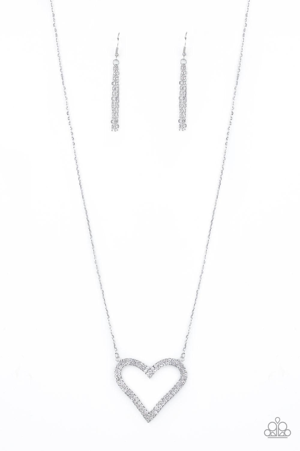 Paparazzi Accessories Pull Some HEART-strings - White Two rows of glittery white rhinestones stack into a sparkling heart pendant at the bottom of a lengthened silver chain for a heart-stopping look. Features an adjustable clasp closure. Jewelry
