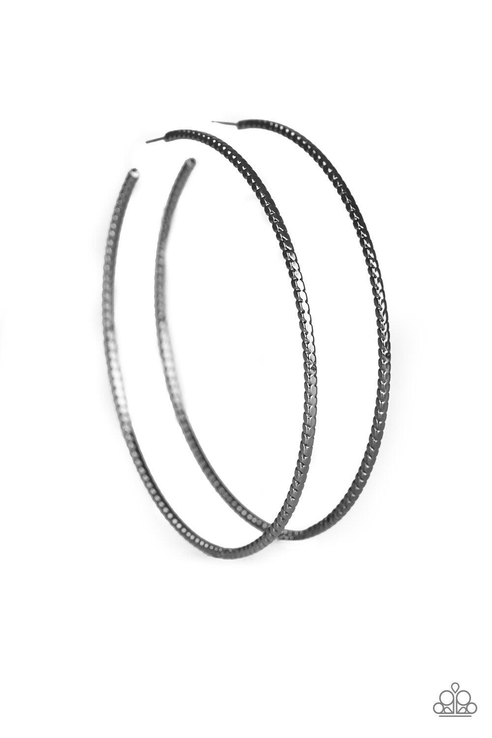 Paparazzi Accessories Shimmer Maker - Black A textured gunmetal bar curls into an oversized hoop for a dramatic look. Earring attaches to a standard post fitting. Hoop measures 3 1/2" in diameter. Jewelry