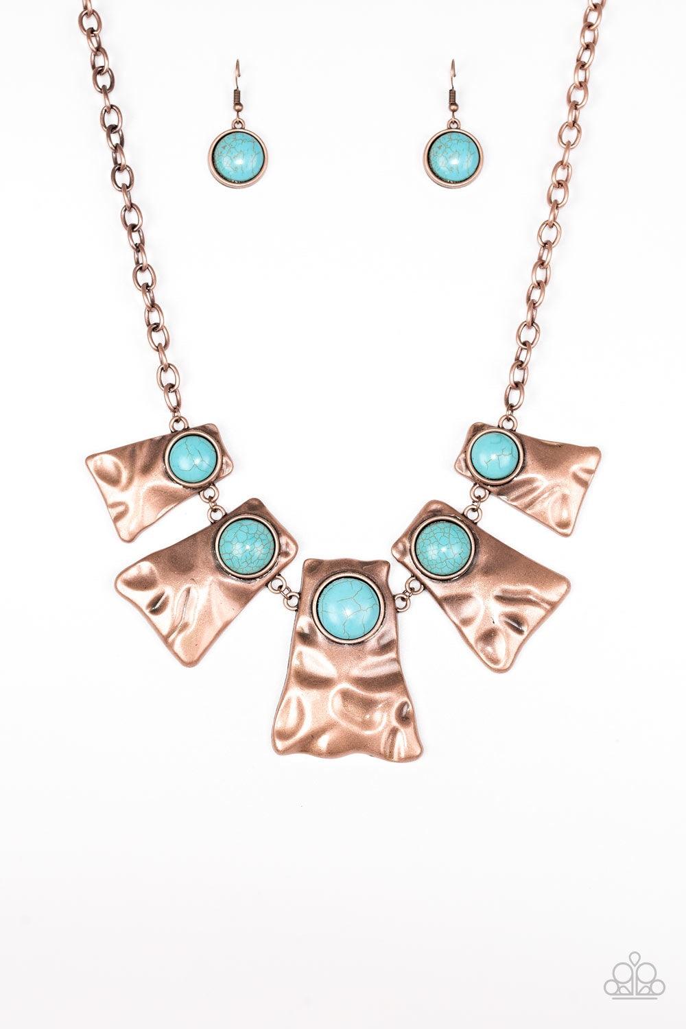 Paparazzi Accessories Cougar - Copper Rippling with hammered details, flared copper frames join below the collar, creating a fierce fringe. Refreshing turquoise stones are pressed into the tops of the frames for a colorful finish. Features an adjustable c