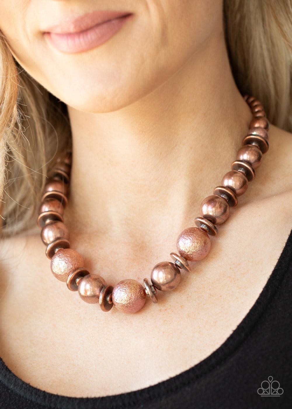 Paparazzi Accessories Twinkle Twinkle, I’m The Star ~Copper Brushed in a stellar iridescence, hammered copper beads, classic copper beads, and antiqued copper discs gradually increase in size as they join below the collar for a glamorous look. Features an