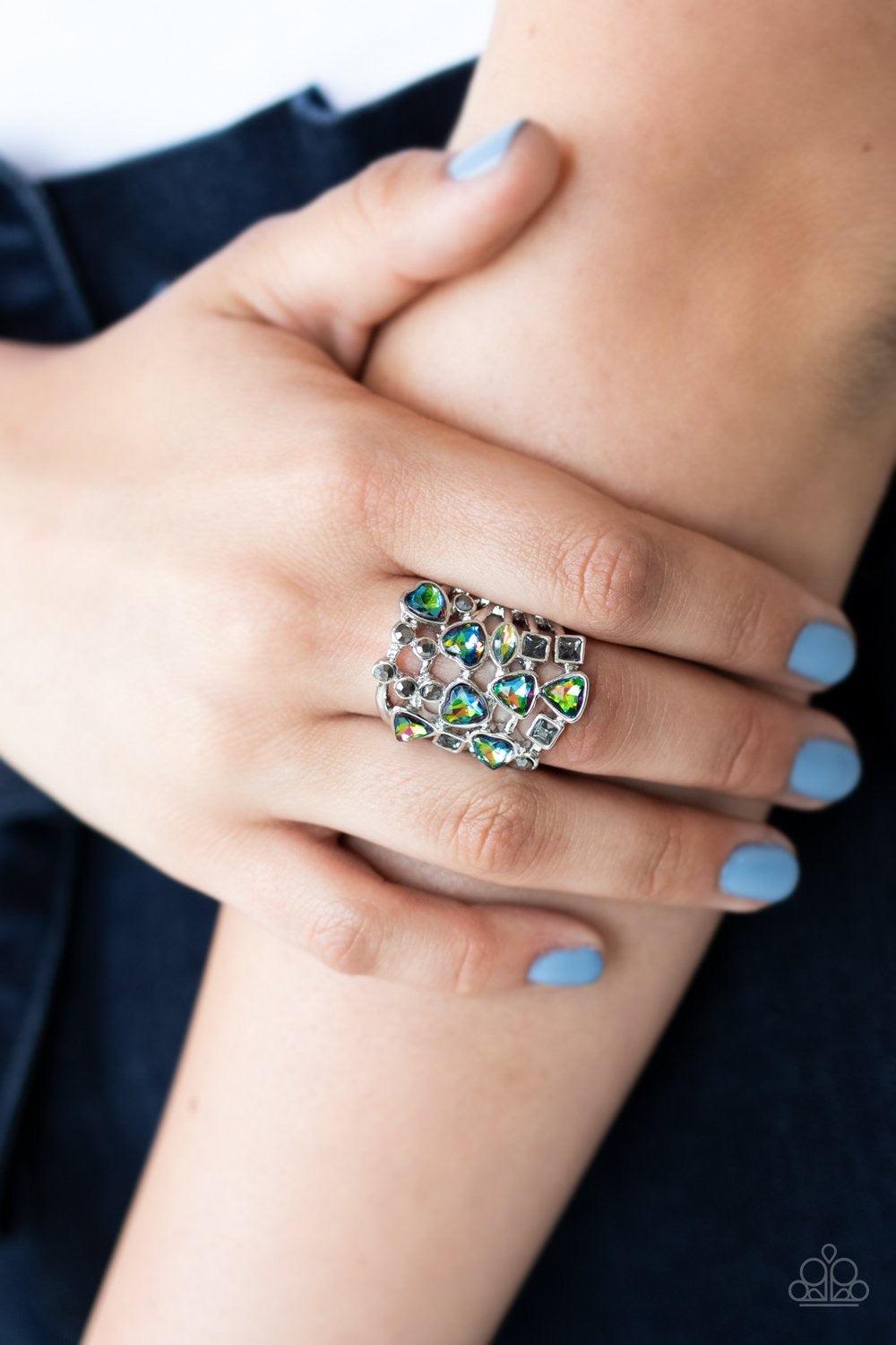 Paparazzi Accessories Glitter Flirt - Multi Featuring oil spill finishes, an iridescent collection of oval, triangular, and heart shaped rhinestones scatter across rows of dainty layered silver bars. Dainty hematite rhinestones and smoky square rhinestone