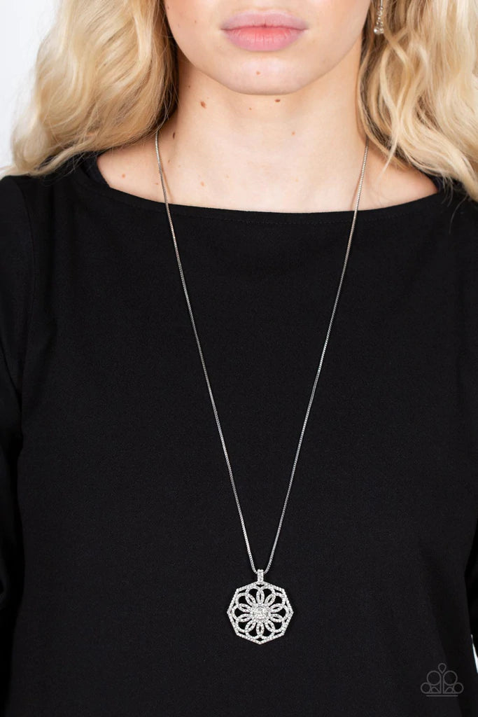 Paparazzi Accessories Botanical Bling - White A spiraling floral frame is encrusted in glassy white rhinestones, resulting in a timeless pendant at the bottom of a dainty silver box chain. Features an adjustable clasp closure. Sold as one individual neckl