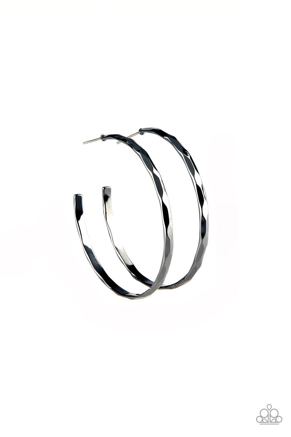 Paparazzi Accessories Geo Edge - Black Delicately hammered in shimmery geometrical textures, a skinny gunmetal hoop curls around the ear for an edgy look. Earring attaches to a standard fishhook fitting. Hoop measures 1 3/4" in diameter. Jewelry