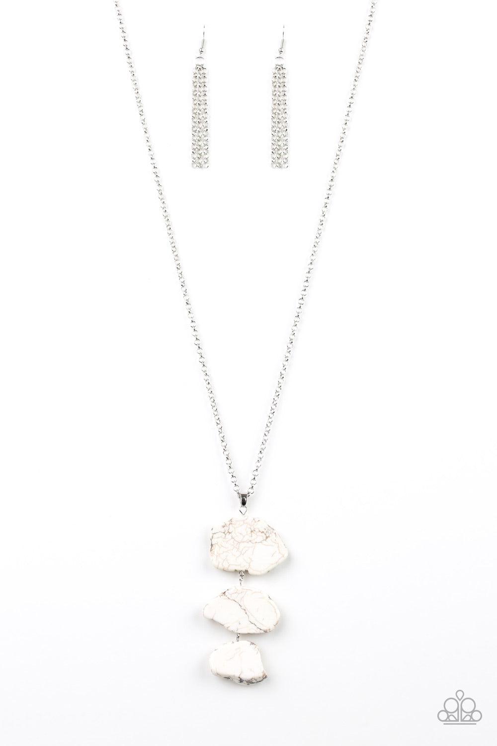 Paparazzi Accessories On The ROAM Again - White As if chipped off a cliff, pieces of white rock link at the bottom of a lengthened silver chain for an earthy look. As the stone elements in this piece are natural, some color variation is normal. Features a