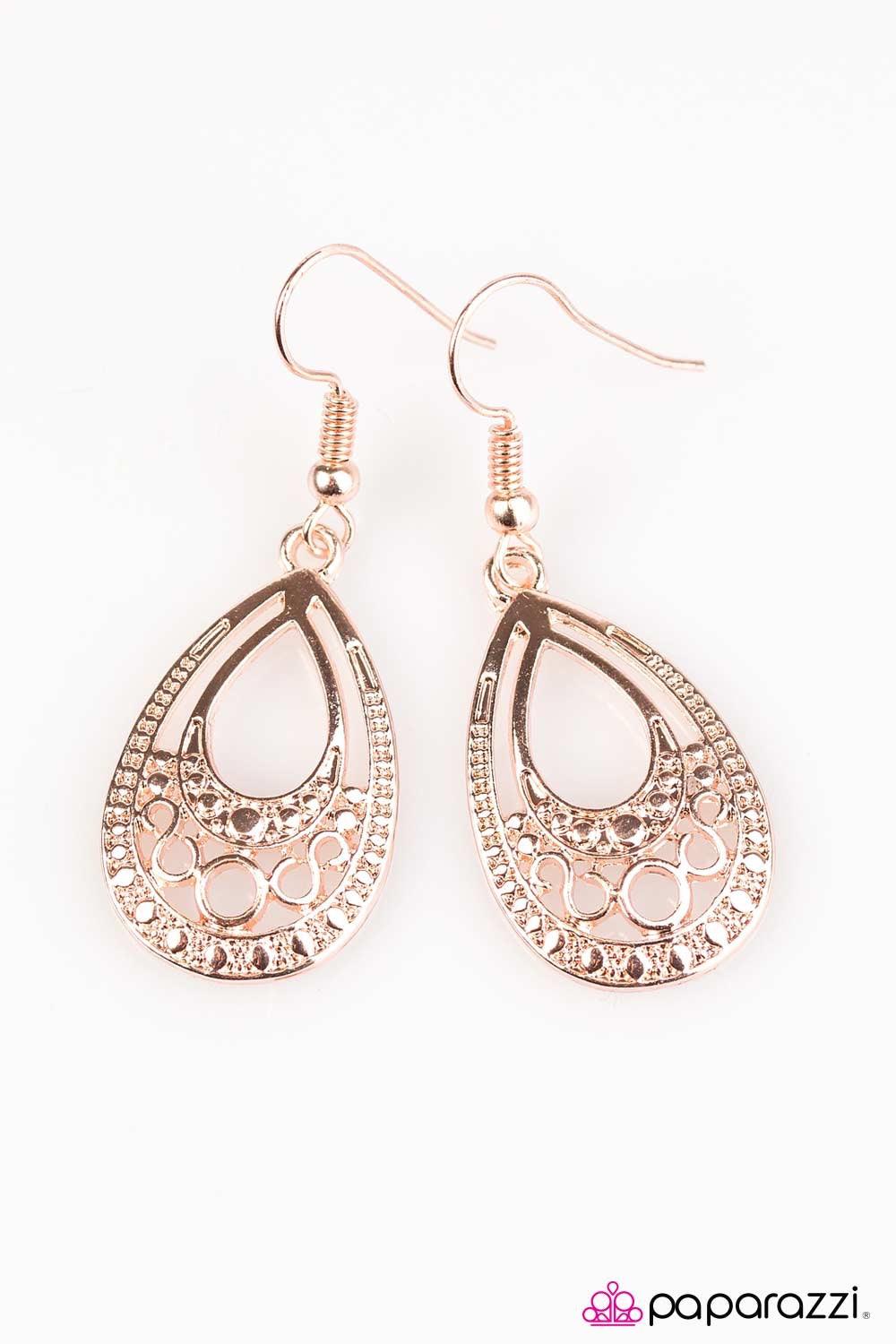 Paparazzi Accessories Desert Rain - Rose Gold Brushed in a glistening finish, rose gold filigree swirls along the bottom of a teardrop frame, adding a frilly pattern to the textured lure. Earring attaches to a standard fishhook fitting. Jewelry