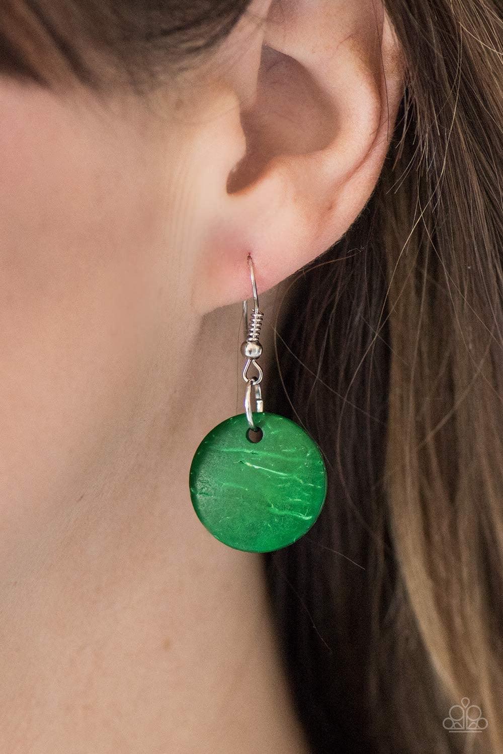 Paparazzi Accessories Fiji Flair - Green Tinted in an iridescent finish, green wooden discs and brown beads are knotted into four summery strands below the collar. The colorful accents gradually increase in size, adding depth to the layered look. Features