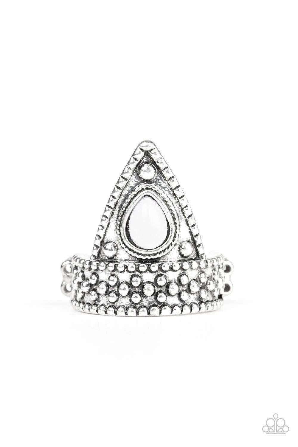 Paparazzi Accessories Tropical Escapade - White A shiny white bead is pressed into the center of a triangular frame atop a studded silver band for a seasonal flair. Features a dainty stretchy band for a flexible fit.Sold as one individual ring. Jewelry