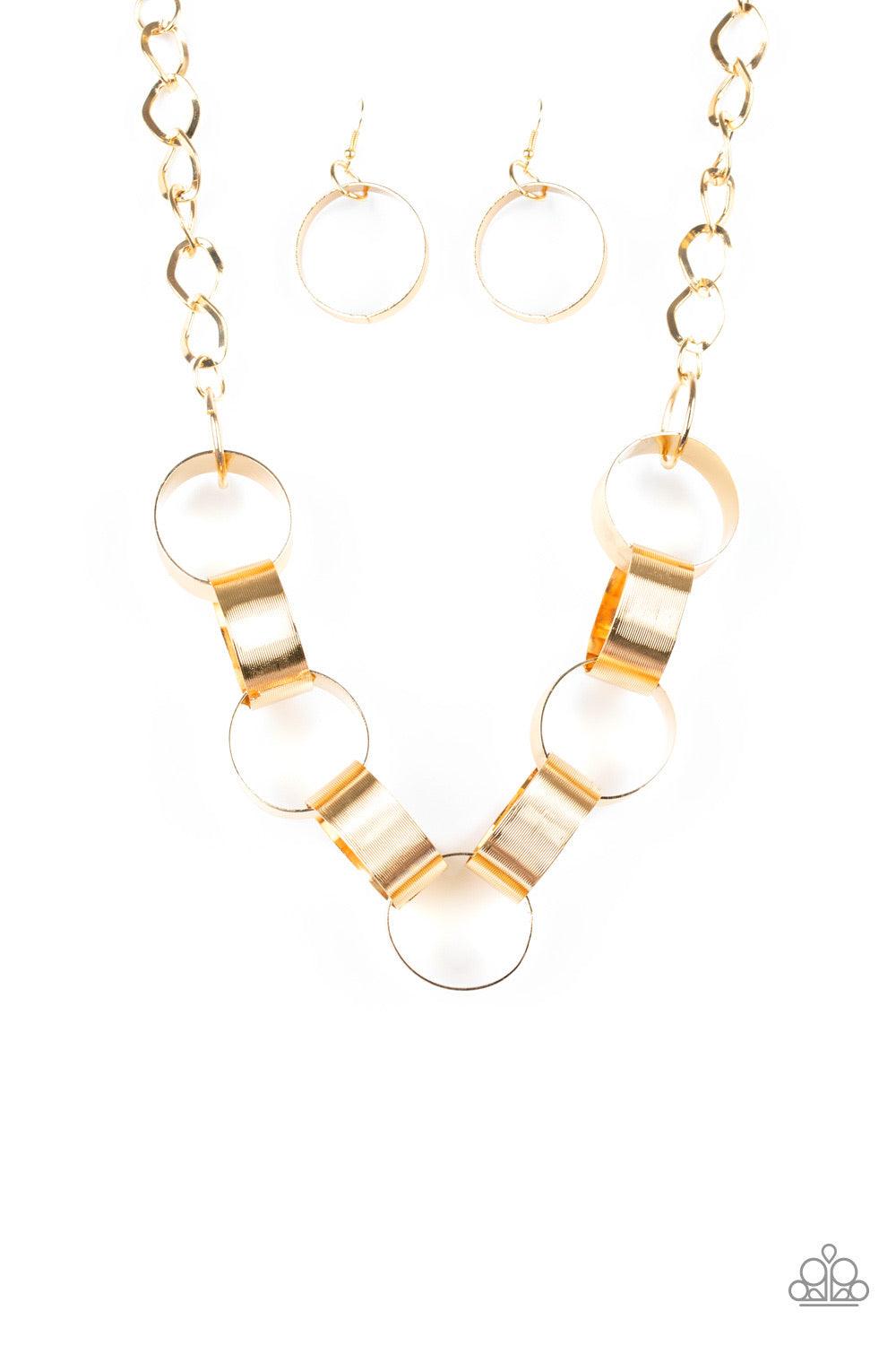 Paparazzi Accessories Big Hit - Gold Etched in linear patterns, dramatically oversized gold links connect below the collar for a bold statement-making look. Features an adjustable clasp closure. Jewelry