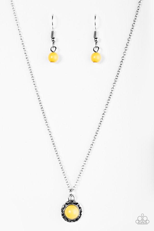 Paparazzi Accessories Wildflower Walt - Yellow A polished yellow bead is pressed into the center of a silver frame etched in floral details. Brushed in an antiqued shimmer, the dainty pendant swings below the collar in a whimsical fashion. Features an adj
