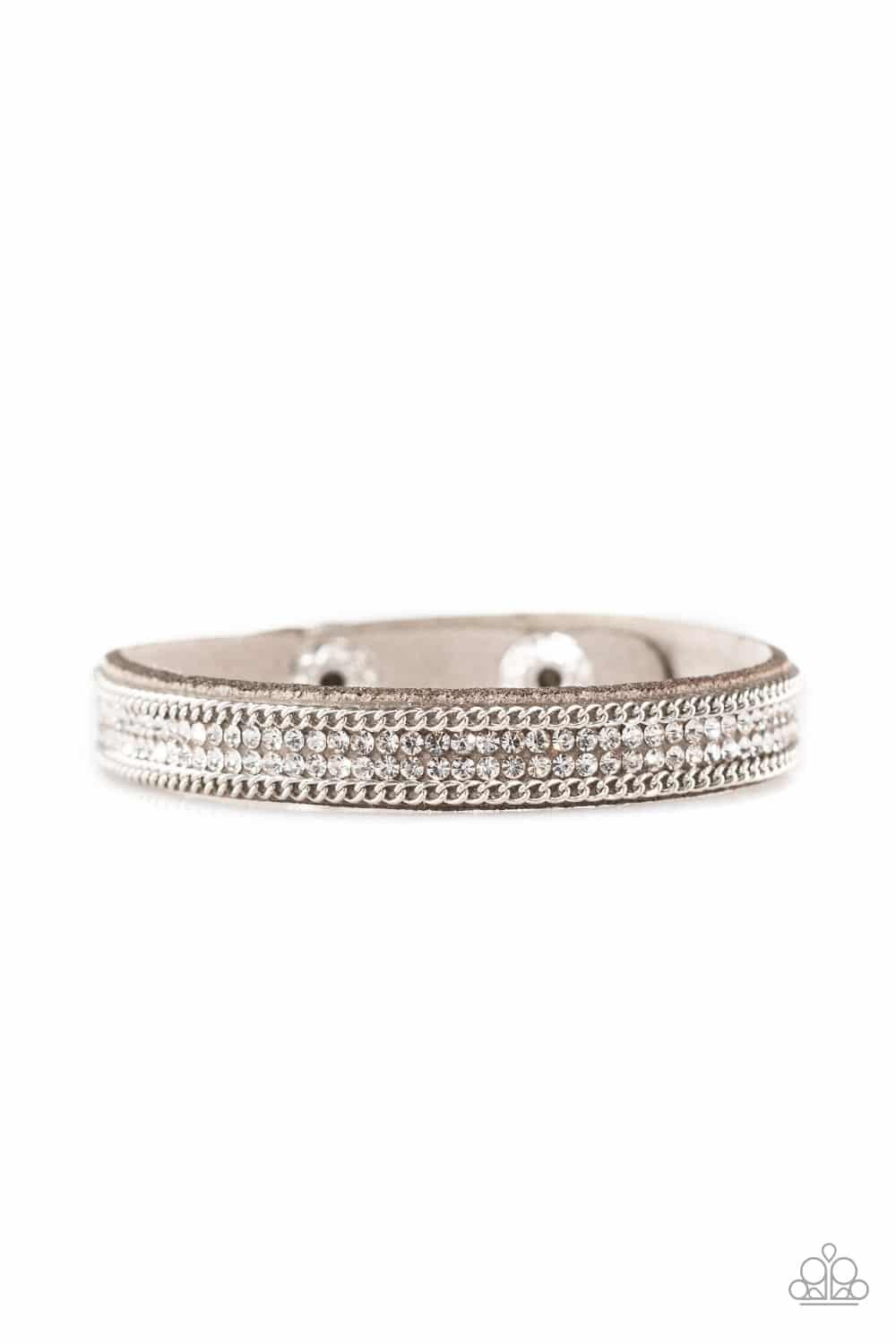 Paparazzi Accessories Babe Bling - Silver A skinny strand of gray suede is encrusted in rows of glittery white rhinestones and shimmery silver chains for a sassy look. Features an adjustable clasp closure.Sold as one individual bracelet. Jewelry