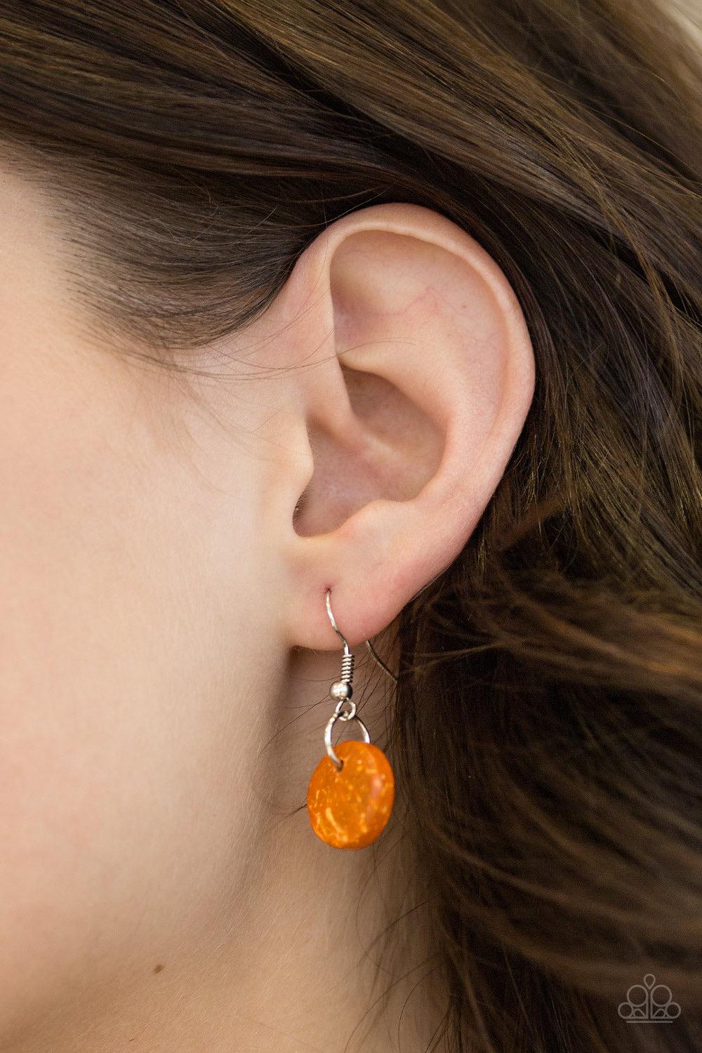 Paparazzi Accessories Hoppin Honolulu - Orange Tinted in a vivacious orange finish, distressed wooden discs trickle along strands of knotted brown cording, creating colorful layers below the collar for a seasonal vibe. Features a button-loop closure. Jewe
