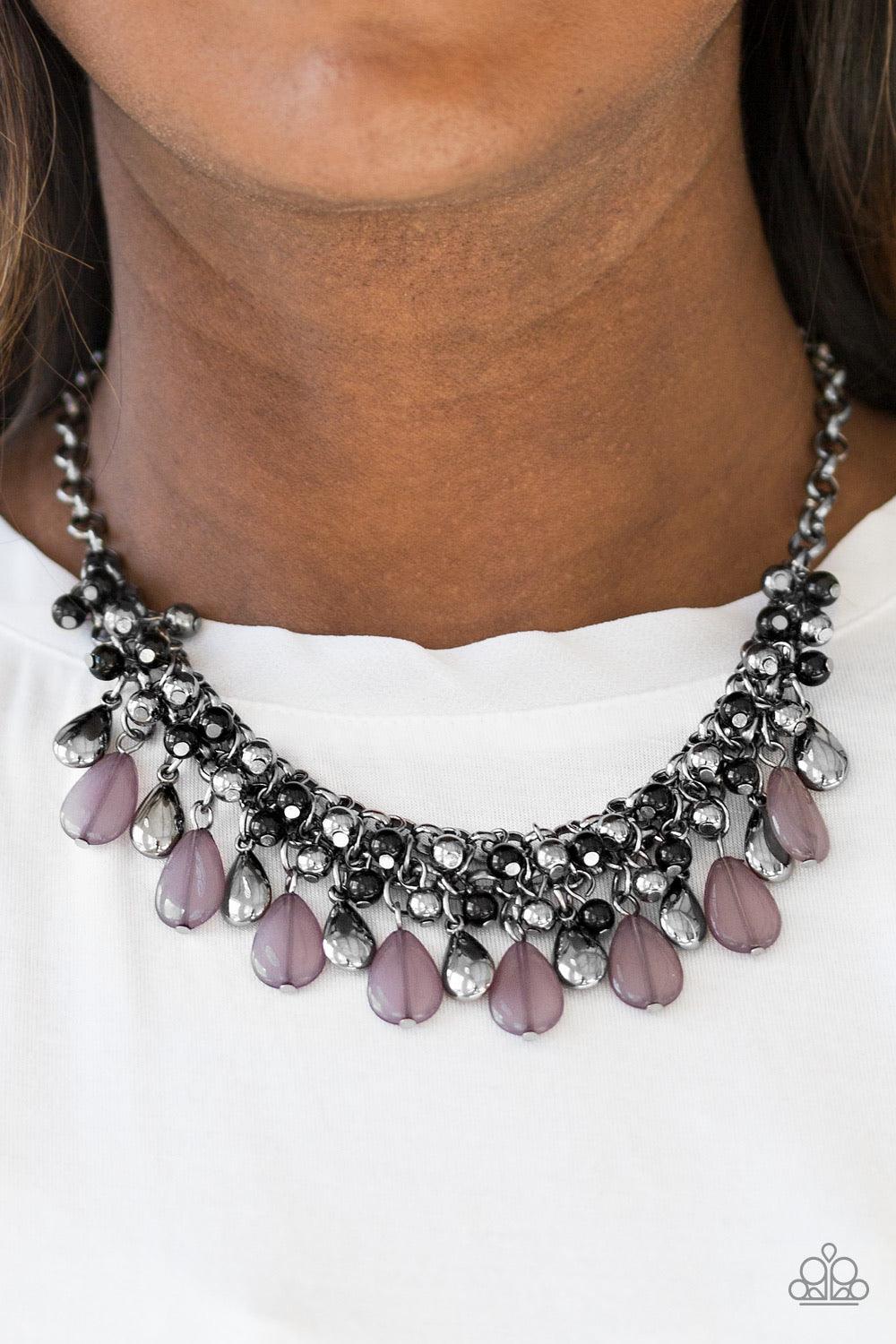 Paparazzi Accessories Diva Attitude - Black Glistening gunmetal and smoky teardrops drip from the bottom of interlocking gunmetal chains. Matching gunmetal and black beads trickle down the rows of chain, creating a bold fringe below the collar. Features a