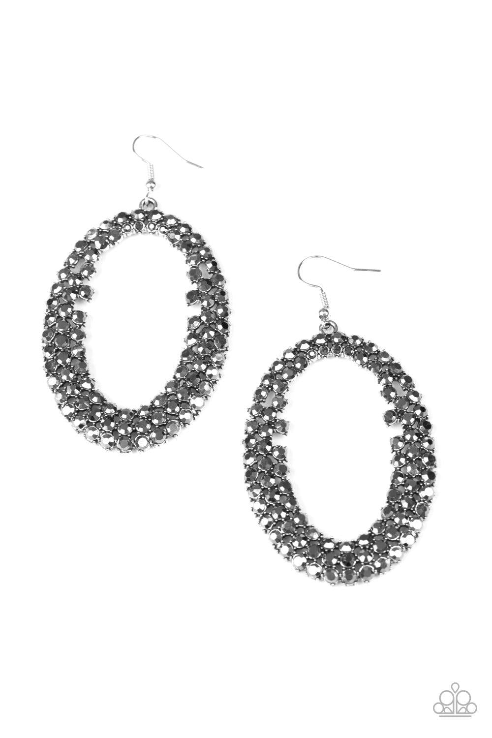 Paparazzi Accessories Radical Razzle - Silver Row after row of glittery hematite rhinestones encircle into an oversized hoop, creating a gritty glamorous look. Earring attaches to a standard fishhook fitting. Sold as one pair of earrings. Jewelry