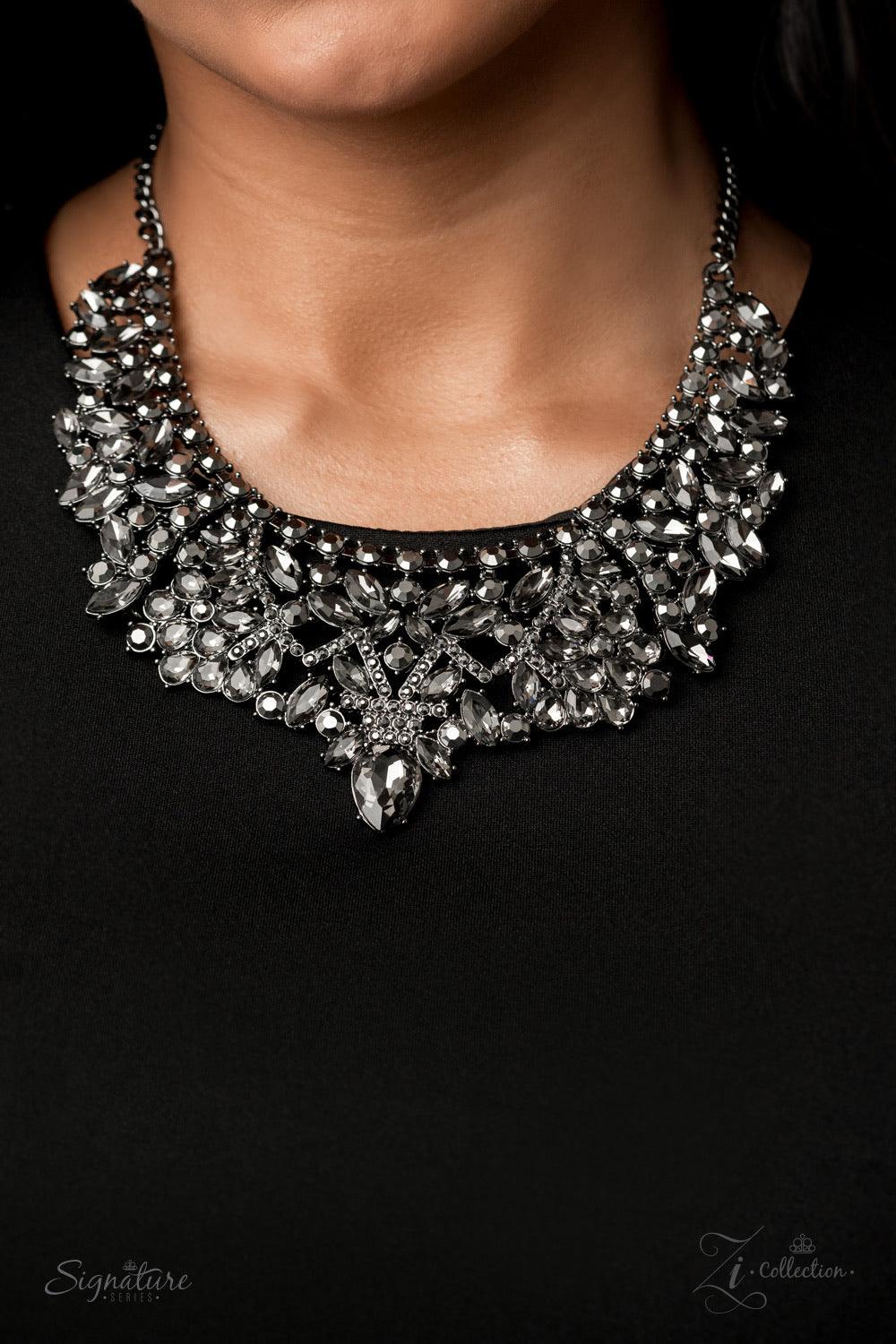 Paparazzi Accessories The Tina 💗💗ZiCollection $25💗💗 An infinite display of smoky marquise cut rhinestones and dazzling hematite rhinestones meticulously join into three dramatically dazzling frames below the collar. Attached to classic gunmetal chains