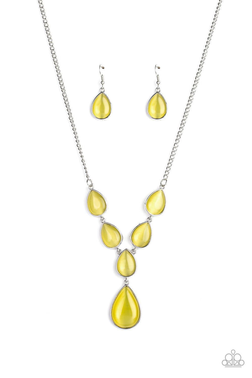 Paparazzi Accessories Dewy Decadence - Yellow A series of yellow cat's eye teardrops interlock at the bottom of a silver chain, giving way to an oversized teardrop pendant for a refined finish. Features an adjustable clasp closure. Jewelry