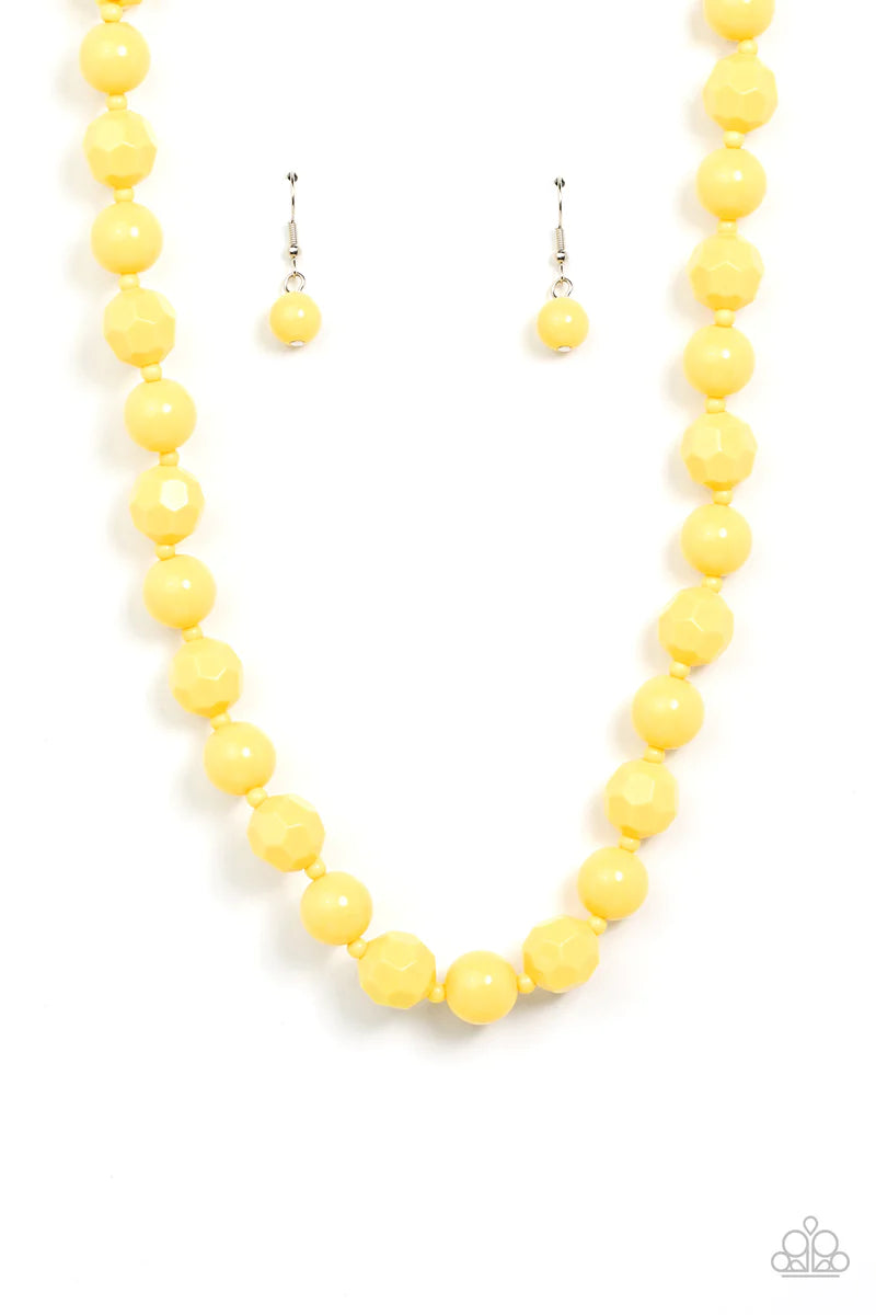 Paparazzi Accessories Popping Promenade - Yellow Infused with dainty yellow beads, a bubbly collection of smooth and faceted yellow beads alternate along an invisible wire below the collar for a sunny pop of color. Features an adjustable clasp closure. So