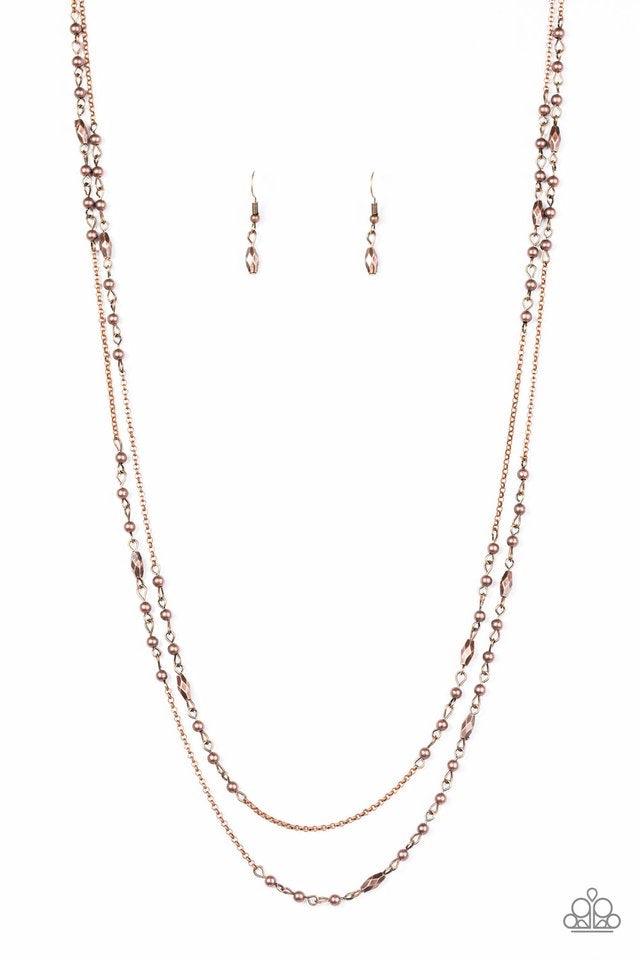 Paparazzi Accessories Rustic Allure - Copper Dainty copper beads and faceted copper accents trickle along two strands of glistening copper chain, creating a rustic tone on tone palette. Features an adjustable clasp closure. Sold as one individual necklace
