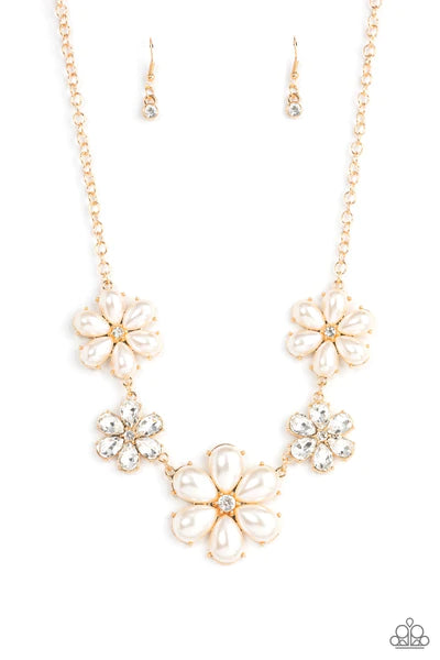 Paparazzi Accessories Fiercely Flowering - Gold Featuring glassy white rhinestone centers, bubbly pearl petaled gold flowers gradually increase in size as they alternate with white rhinestone petaled flowers below the collar for a fierce floral fashion. F