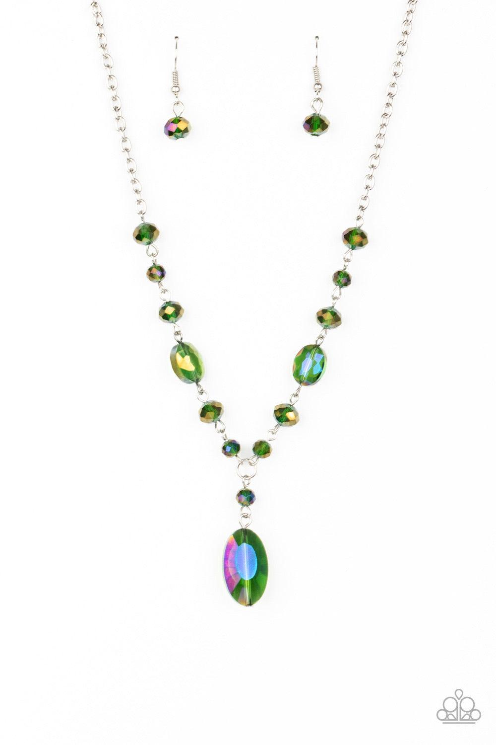 Paparazzi Accessories Fashionista Week - Green Featuring an iridescent shimmer, an oval green crystal-like bead swings from the bottom of a matching crystal-beaded chain, creating an elegantly extended pendant below the collar. Features an adjustable clas
