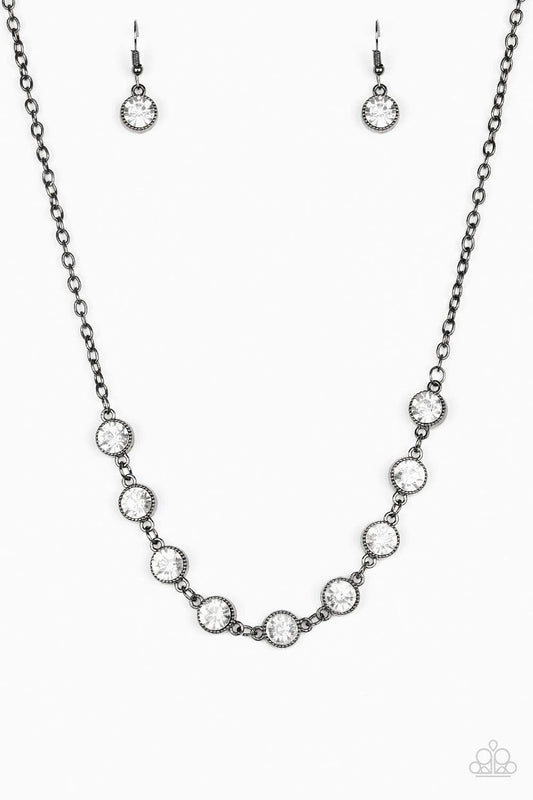 Paparazzi Accessories Starlit Socials - Black Encased in studded gunmetal frames, glittery white rhinestones link below the collar for a glamorous look. Features an adjustable clasp closure. Sold as one individual necklace. Includes one pair of matching e