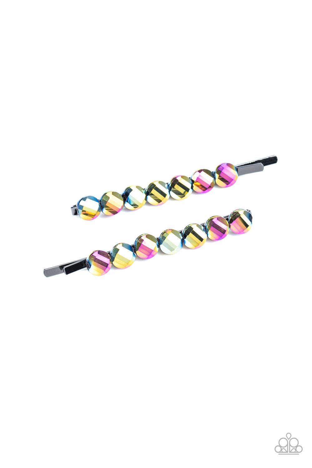 Paparazzi Accessories Easy On The Hairspray - Multi Featuring oil spill finishes, faceted metallic beads dot the tops of two gunmetal bobby pins, creating an iridescent duo. Sold as one pair of decorative bobby pins. Hair Accessories