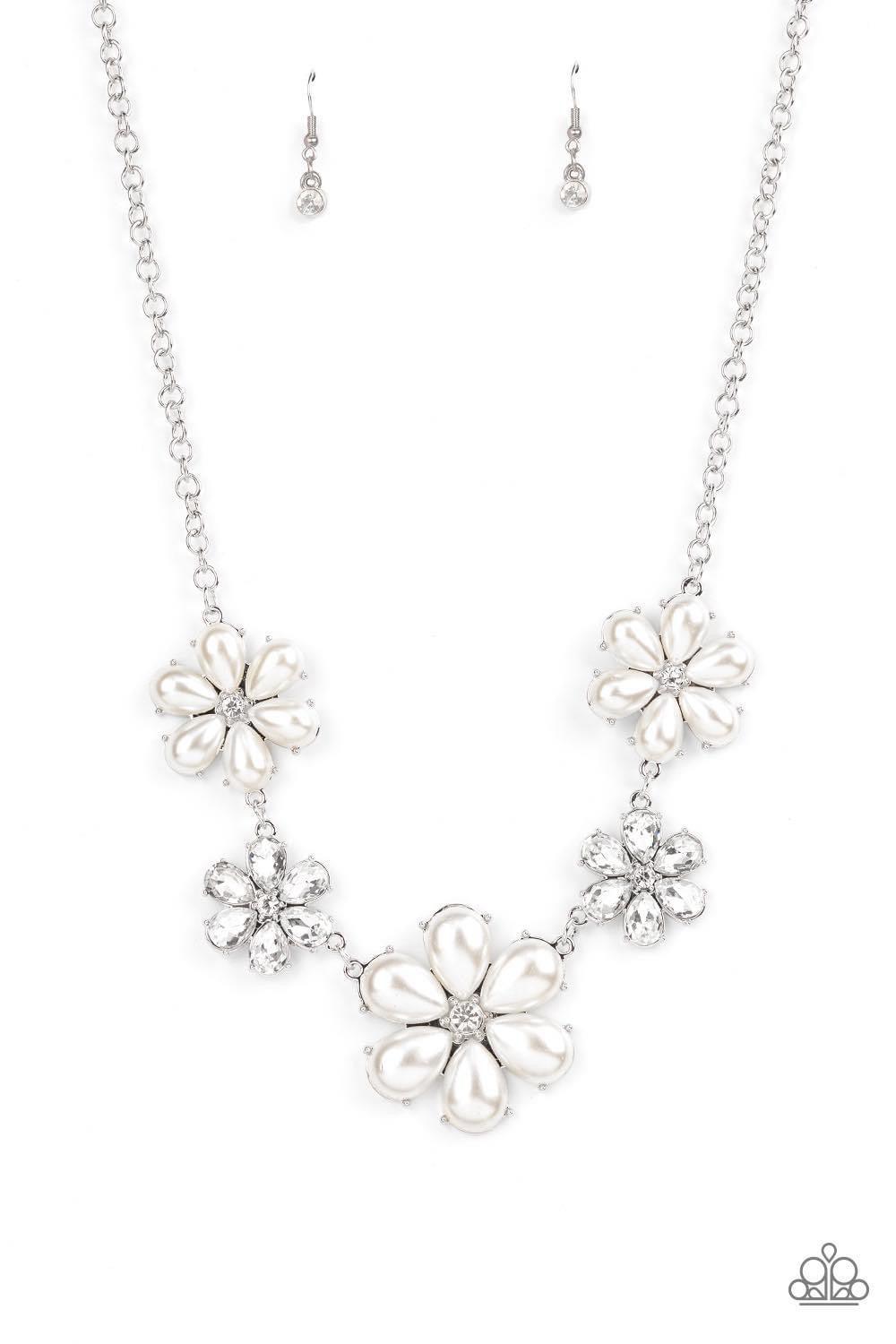 Paparazzi Accessories Fiercely Flowering - White Featuring glassy white rhinestone centers, bubbly pearl petaled flowers gradually increase in size as they alternate with white rhinestone petaled flowers below the collar for a fierce floral fashion. Featu