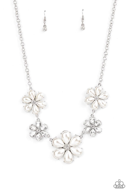 Paparazzi Accessories Fiercely Flowering - White Featuring glassy white rhinestone centers, bubbly pearl petaled flowers gradually increase in size as they alternate with white rhinestone petaled flowers below the collar for a fierce floral fashion. Featu