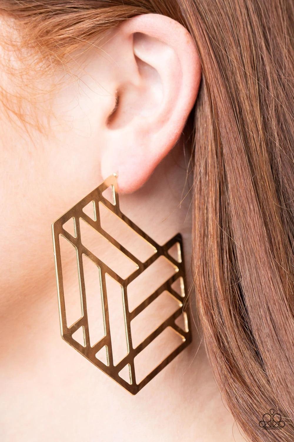 Paparazzi Accessories Gotta Get GEO-ing - Gold Flat gold bars connect into an edgy hexagonal frame, creating a chic geometric hoop. Earring attaches to a standard post fitting. Hoop measures approximately 2 3/4" in diameter.Sold as one pair of hoop earrin