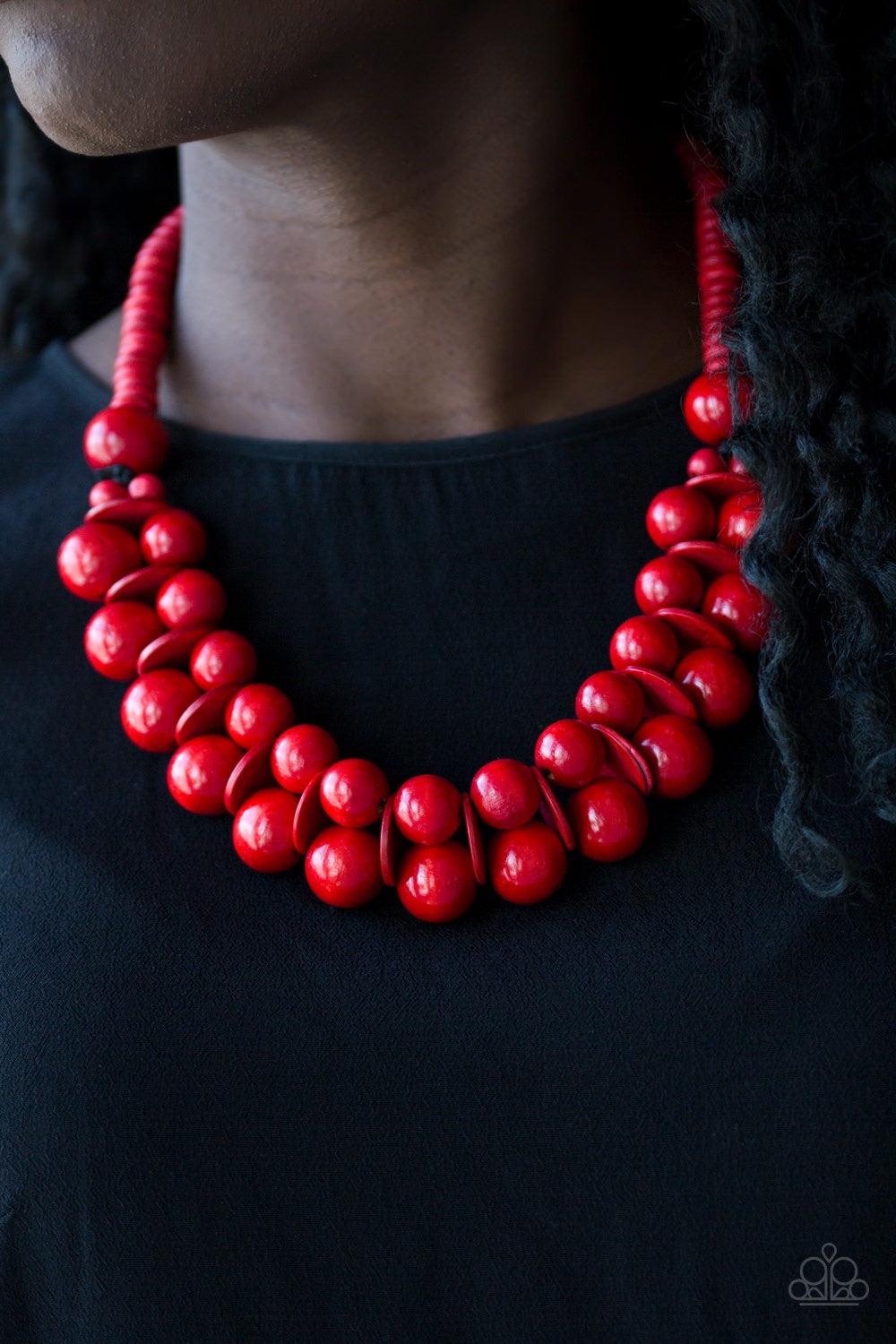 Paparazzi Accessories Caribbean Cover Girl - Red Brushed in a distressed finish, fiery red wooden beads and discs join below the collar for a summery look. Features a button loop closure. Jewelry