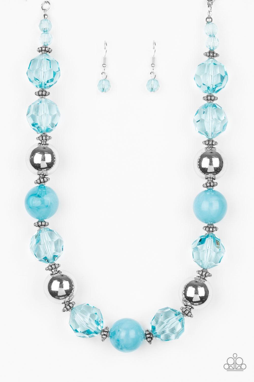 Paparazzi Accessories Very Voluminous ~Blue Infused with dainty silver accents, an exaggerated display of oversized silver beads, faceted blue crystal-like beads, and cloudy blue beads are threaded along an invisible wire below the collar for a colorfully