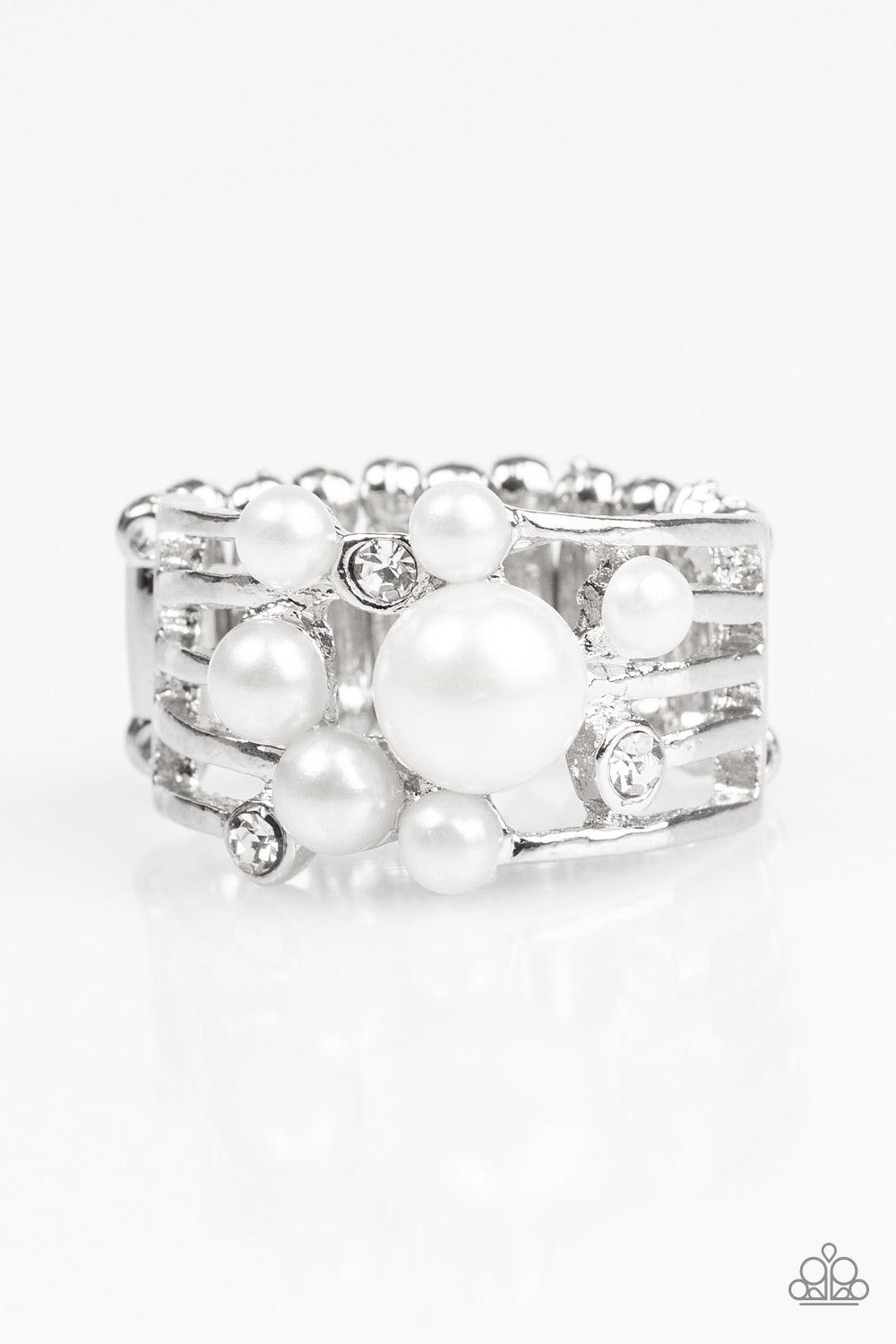 Paparazzi Accessories Meet Me At The Altar - White Bubbly white pearls and glittery white rhinestones are sprinkled across airy silver bands, creating a romantic centerpiece. Features a stretchy band for a flexible fit. Jewelry