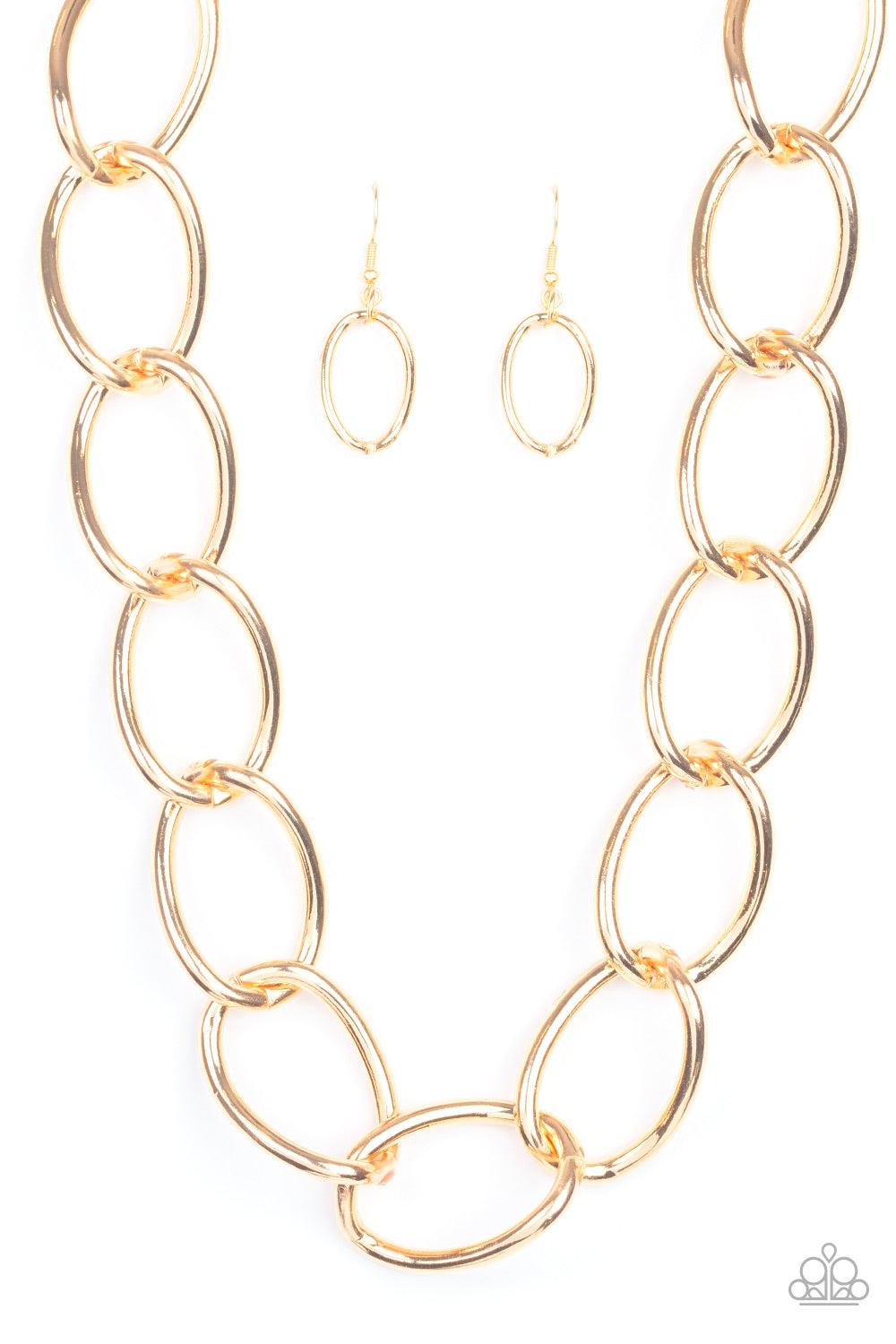 Paparazzi Accessories The Challenger - Gold Dramatically oversized gold links connect below the collar for an exaggerated industrial style. Features an adjustable clasp closure. Jewelry