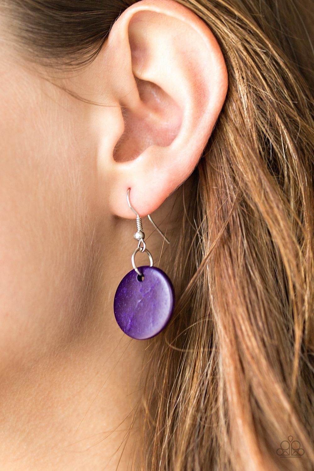 Paparazzi Accessories Wonderfully Walla Walla ~Purple Shiny brown cording knots around mismatched purple wooden beads, creating vivacious layers. Features a button loop closure.