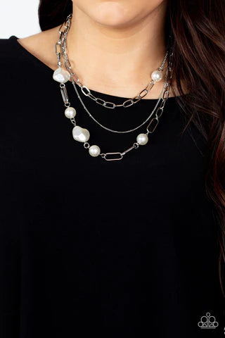 Paparazzi Accessories Modern Innovation - White Bubbly round and imperfectly faceted white pearls haphazardly adorn an assortment of mismatched chunky and dainty silver chains, resulting in an edgy refinement below the collar. Features an adjustable clasp
