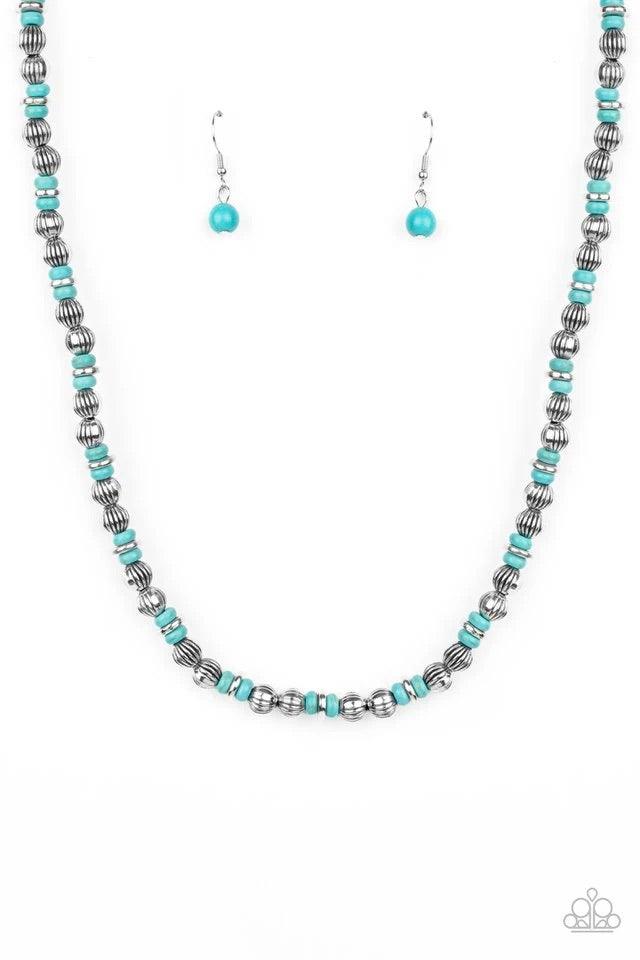 Paparazzi Accessories ZEN You Least Expect It ~Blue A rustic collection of silver discs, ornate silver beads, and refreshing turquoise stones are threaded along an invisible wire below the collar for a seasonal look. Features an adjustable clasp closure.