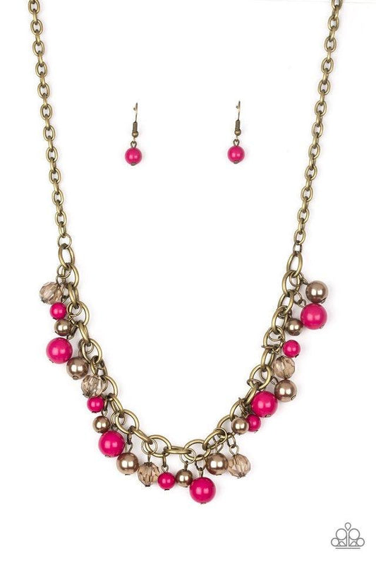Paparazzi Accessories The GRIT Crowd - Pink Pearly brass, polished pink, and glittery crystal-like beads swing from a bold brass chain, creating a refined fringe below the collar. Features an adjustable clasp closure. Jewelry