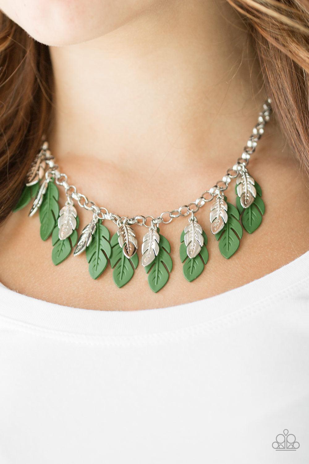 Paparazzi Accessories Rule The Roost - Green Glistening silver and greenfeathers swing from the bottom of a bold silver chain, creating a fierce fringe below the collar. Features an adjustable clasp closure. Sold as one individual Jewelry