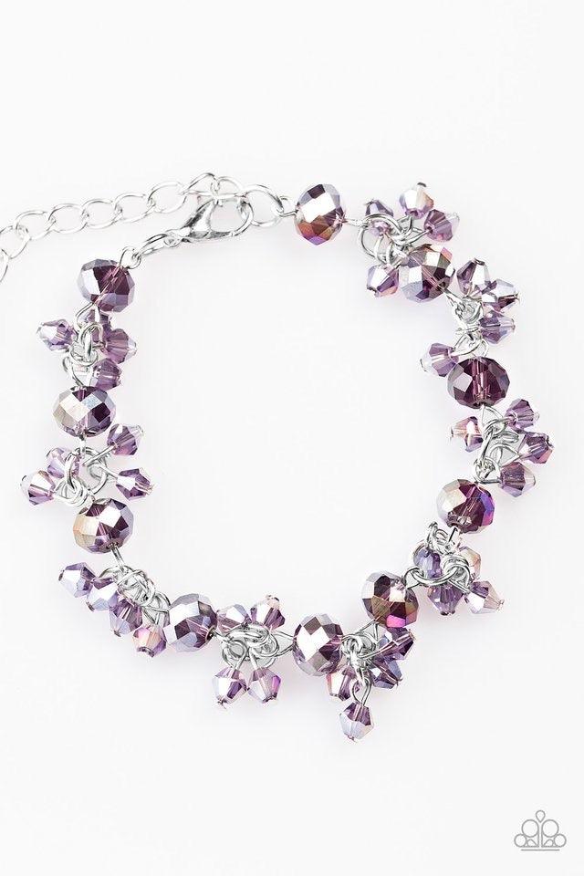 Paparazzi Accessories Oh, My Stars - Purple Glassy and faceted purple crystal beading trickles along a silver chain, creating a dramatic fringe below the collar. Featuring elegant pear-shaped cuts, iridescent crystals cluster atop the glassy gems for an i