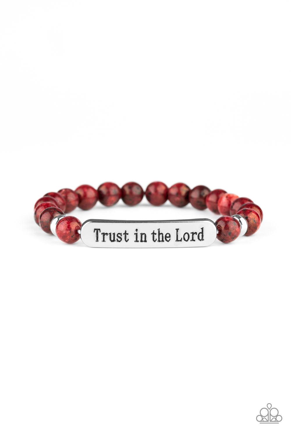 Paparazzi Accessories Trust Always ~Red Infused with dainty silver accents, a collection of glassy red stone beads and a shimmery silver frame stamped in the phrase, "Trust in the Lord", are threaded along a stretchy band around the wrist for an inspirati