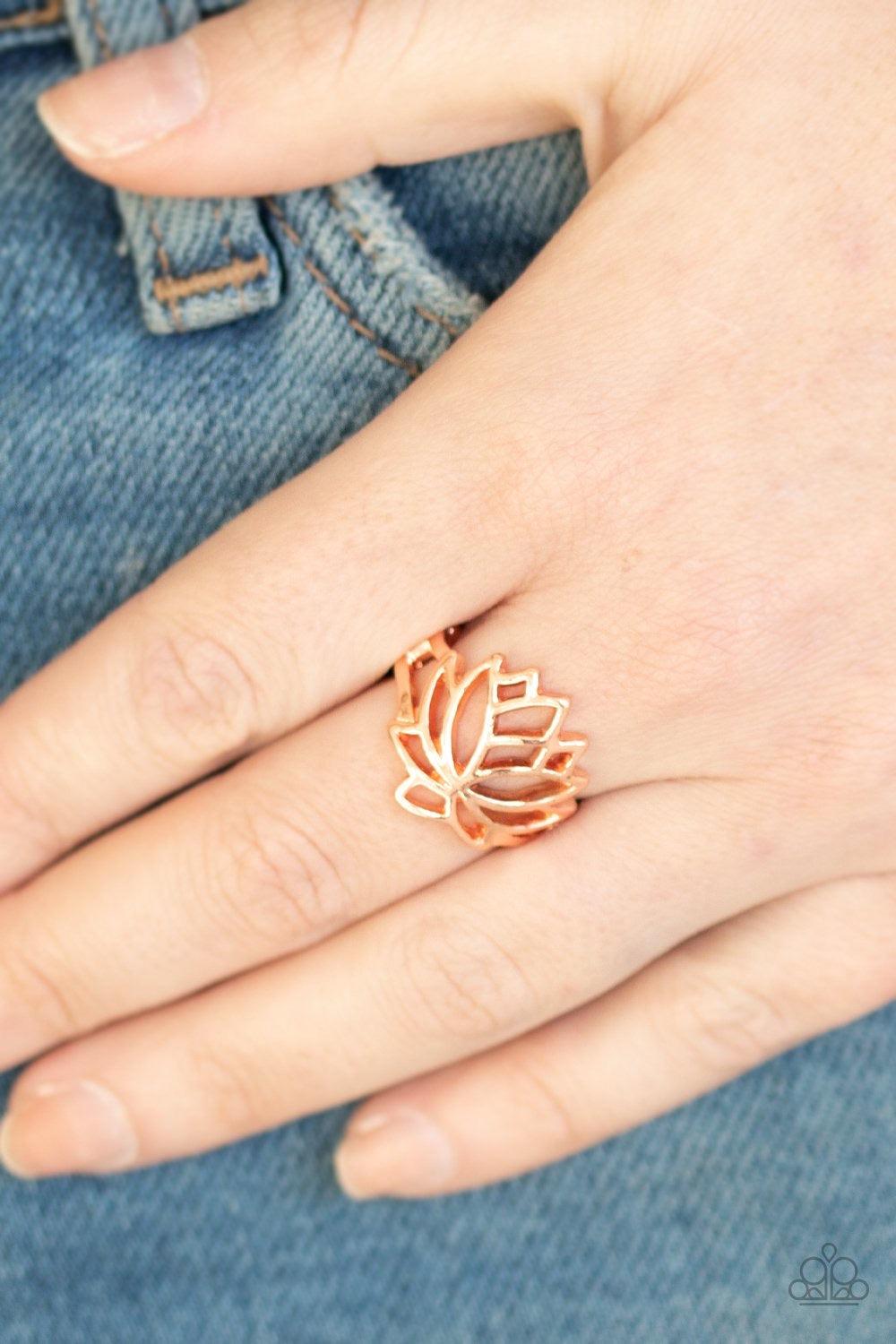 Paparazzi Accessories Lotus Lover - Copper Dainty shiny copper bars delicately climb the finger, blooming into a whimsical lotus centerpiece. Features a dainty stretchy band for a flexible fit. Jewelry