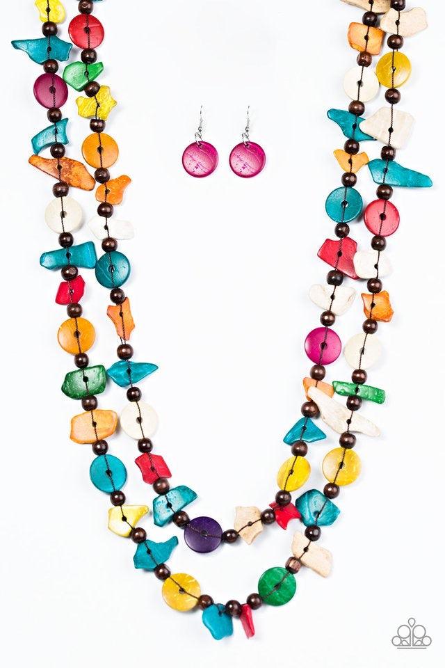 Paparazzi Accessories Living The Tropical Life - Multi Tinted in bright hues, bits of colorful wooden beads and discs join earthy wooden beads along an elongated strand of thread. Try double-wrapping or even triple-wrapping around the neck for a colorfull