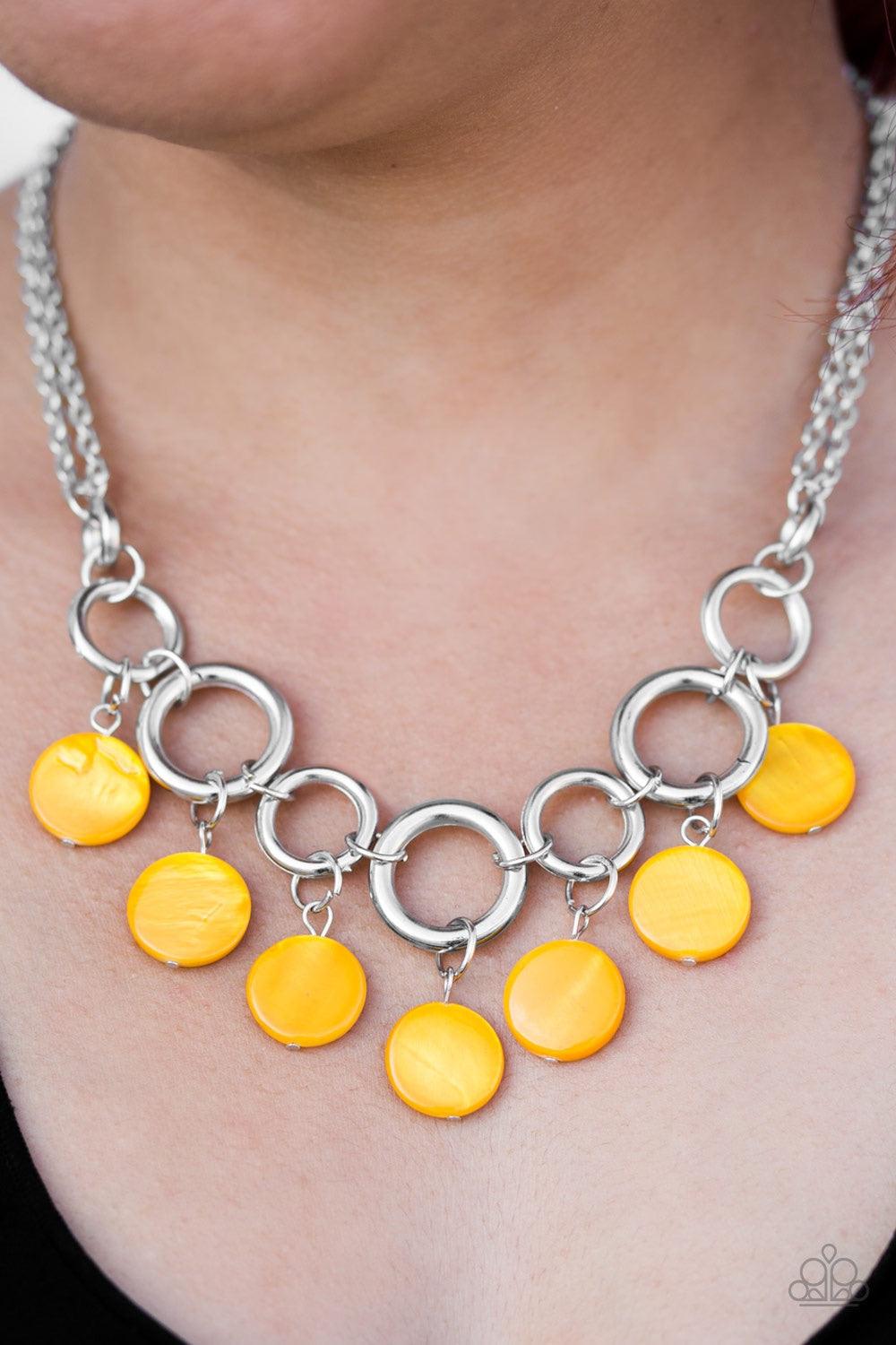 Paparazzi Accessories Coastal Adventure - Yellow Brushed in a shell-like iridescence, shiny yellow beading swings from the bottom of bold silver hoops, creating a colorful fringe below the collar. Features an adjustable clasp closure. Jewelry