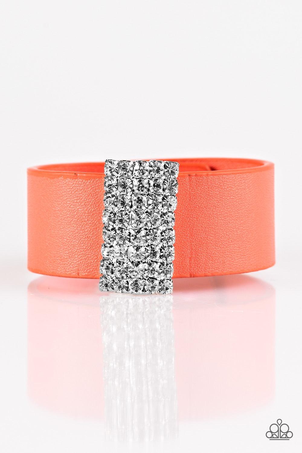 Paparazzi Accessories Walk The CATWALK - Orange Encrusted in glittery white rhinestones, a sparkling frame slides along a strip of coral leather, creating a blinding centerpiece. Features an adjustable snap closure. Jewelry