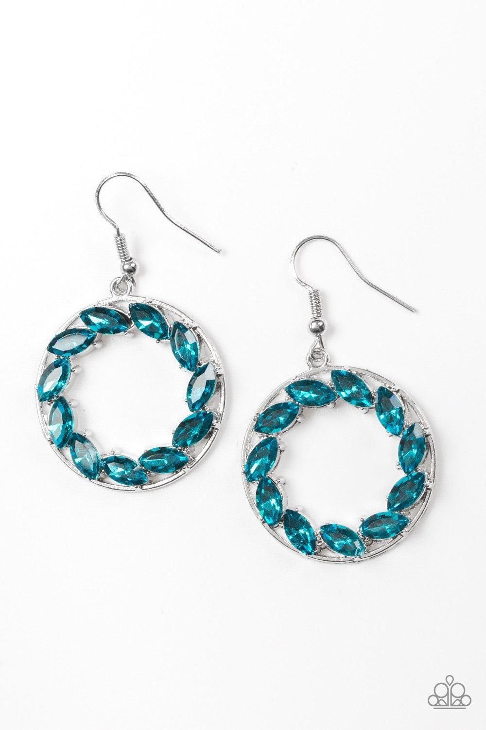 Paparazzi Accessories Global Glow - Blue Featuring regal marquise style cuts, blue rhinestones are encrusted along a shimmery silver hoop for a radiant fashion. Earring attaches to a standard fishhook fitting. Jewelry