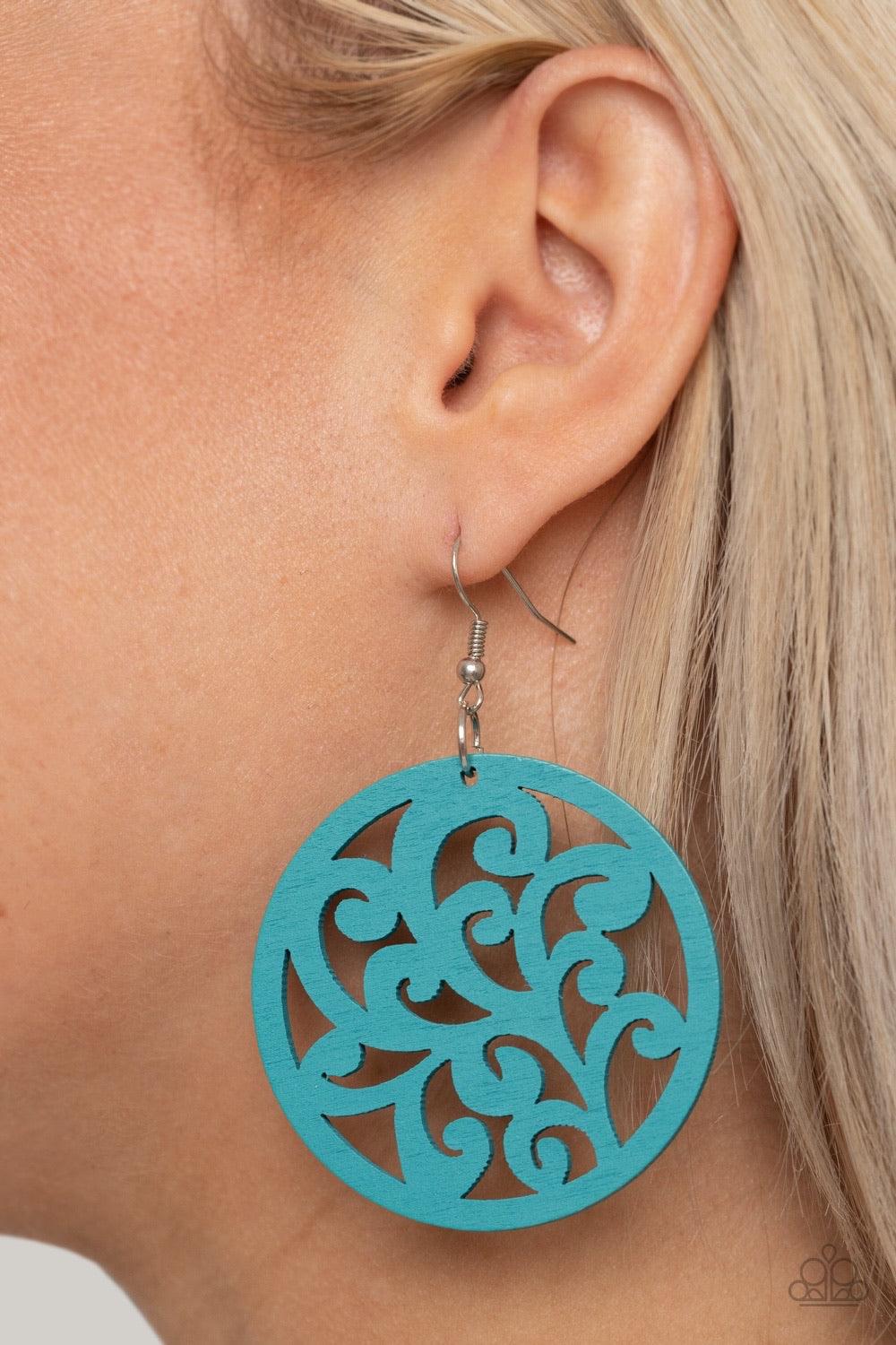 Paparazzi Accessories Fresh Off The Vine - Blue Stenciled in vine-like filigree, a refreshing blue wooden frame swings from the ear for an earthy look. Earring attaches to a standard fishhook fitting. Sold as one pair of earrings. Jewelry