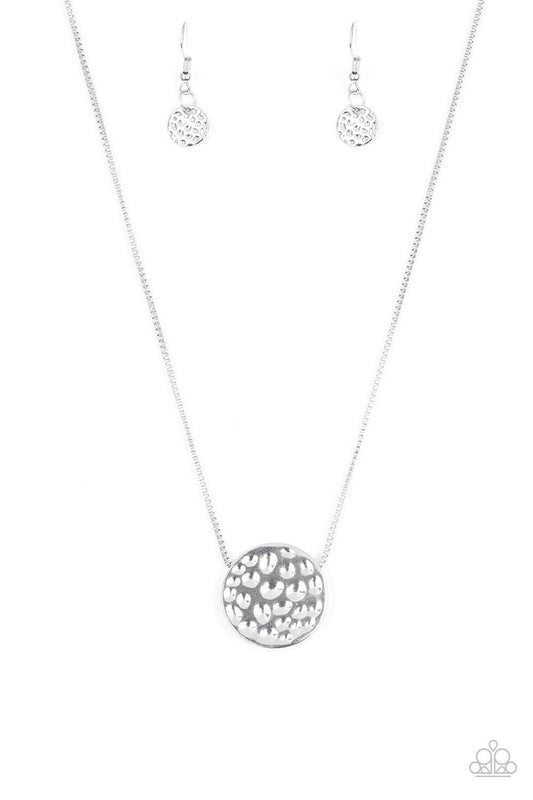 Paparazzi Accessories The BOLD Standard - Silver Delicately hammered in shimmery detail, a glistening silver pendant slides along a dainty silver box-chain below the collar for a bold look. Features an adjustable clasp closure. Sold as one individual neck