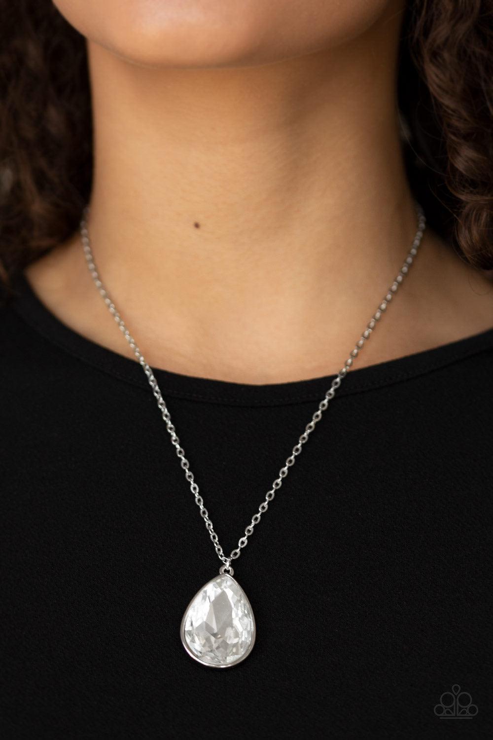 Paparazzi Accessories So Obvious - White Featuring a sleek silver frame, a dramatic white teardrop gem swings below the collar for a glamorous look. Features an adjustable clasp closure. Jewelry