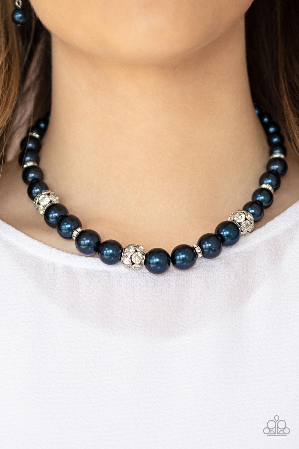 Paparazzi Accessories Rich Girl Refinement - Blue Infused with dainty white rhinestone encrusted rings, a collection of oversized blue pearls and sparkling white rhinestone encrusted beads are threaded along an invisible wire below the collar for a refine