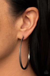 Paparazzi Accessories Monochromatic Curves - Black Etched in ribbed texture, two glistening silver bars gently curve and stack into an oversized hoop for a classic metallic look. Earring attaches to a standard post fitting. Hoop measures approximately 2"