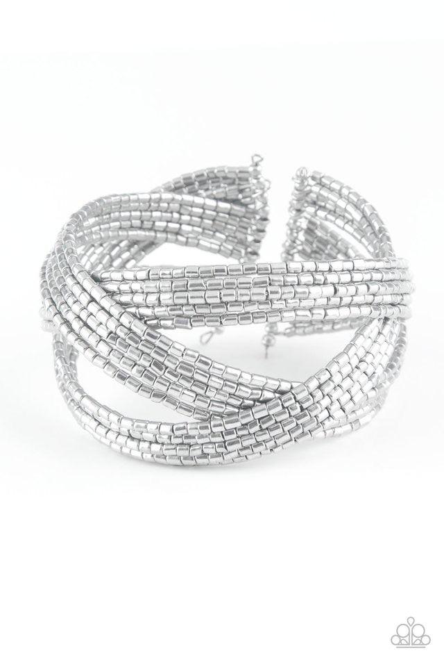 Paparazzi Accessories Shooting Stars - Silver Layers of silver seed beads are braided together to create a breathtaking cuff design that shimmers brilliantly along the wrist. Sold as one individual bracelet. Jewelry